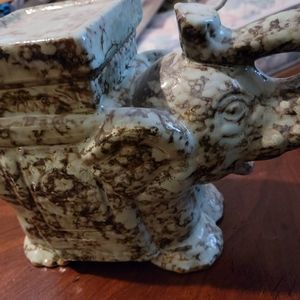 Large elephant plant stand and artillery